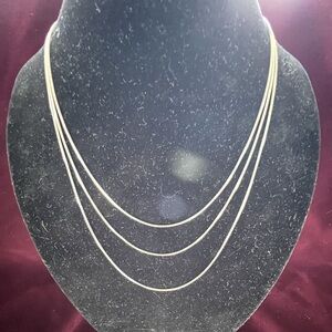 Sterling silver triple strand box chain.